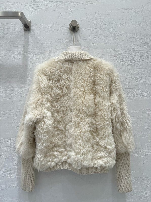 Хутряна куртка жіноча фото 9