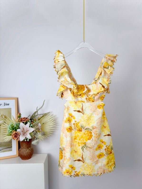 Mini-dress INDRA from ruffles and open back