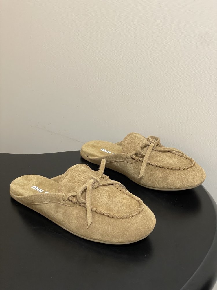 Мюли of suede from braided кантом and decorative bow