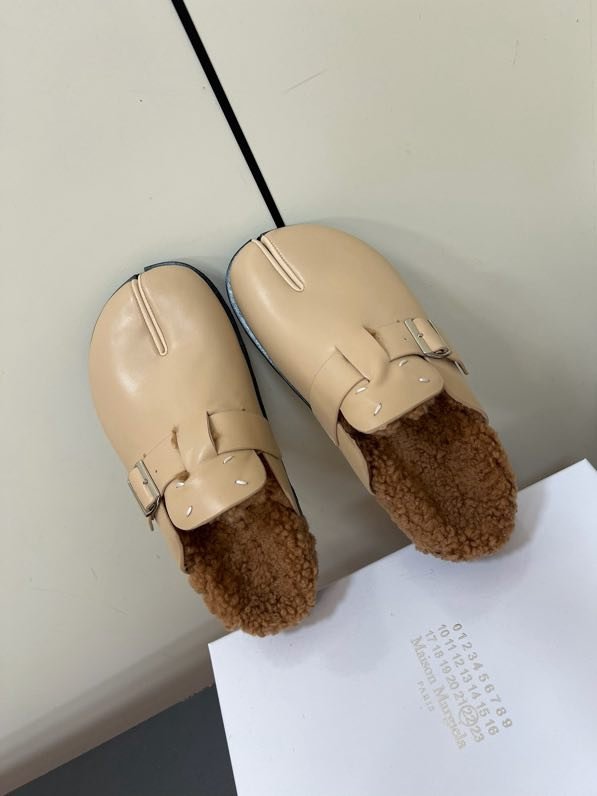 Мюли кожаные на меху фото 5