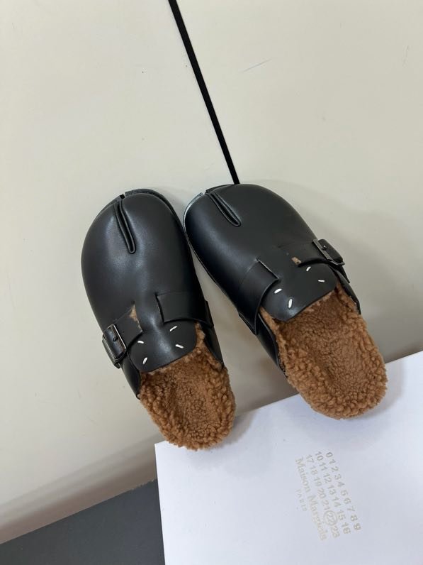 Мюли кожаные на меху фото 6