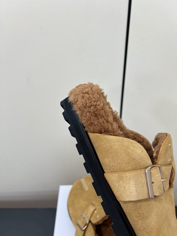 Мюли кожаные на меху фото 6