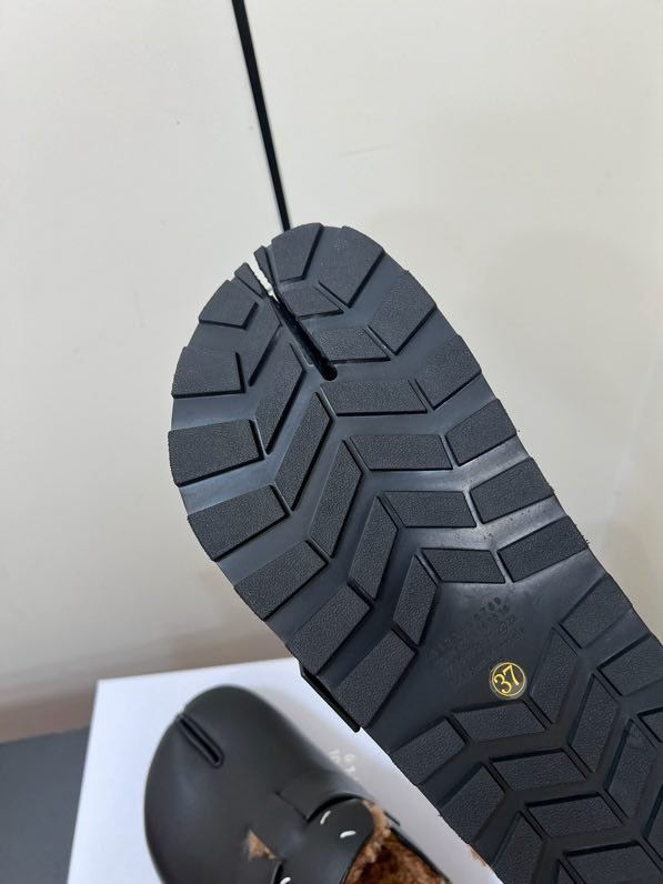 Мюли кожаные на меху фото 8