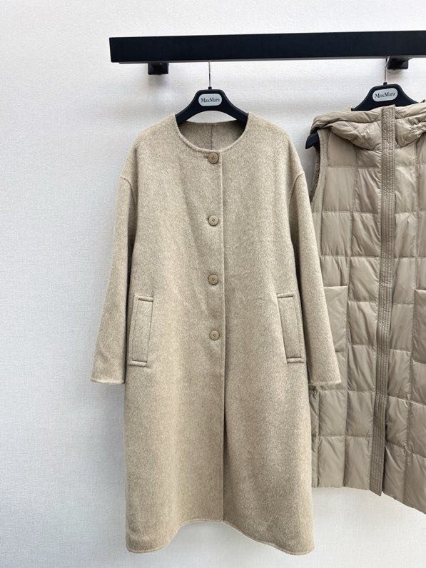 Пальто шерстяное с дллинным пуховым жилетом фото 2