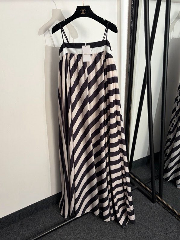 Dress at strip from open shoulders and thin straps