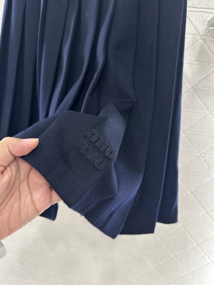 Плиссированная юбка средней длины фото 8