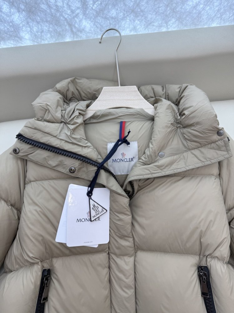 Приталений пуховик середньої довжини на блискавки фото 6