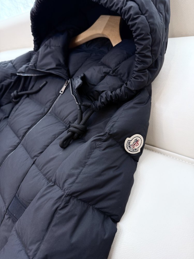 Пуховик довгий жіночий фото 7