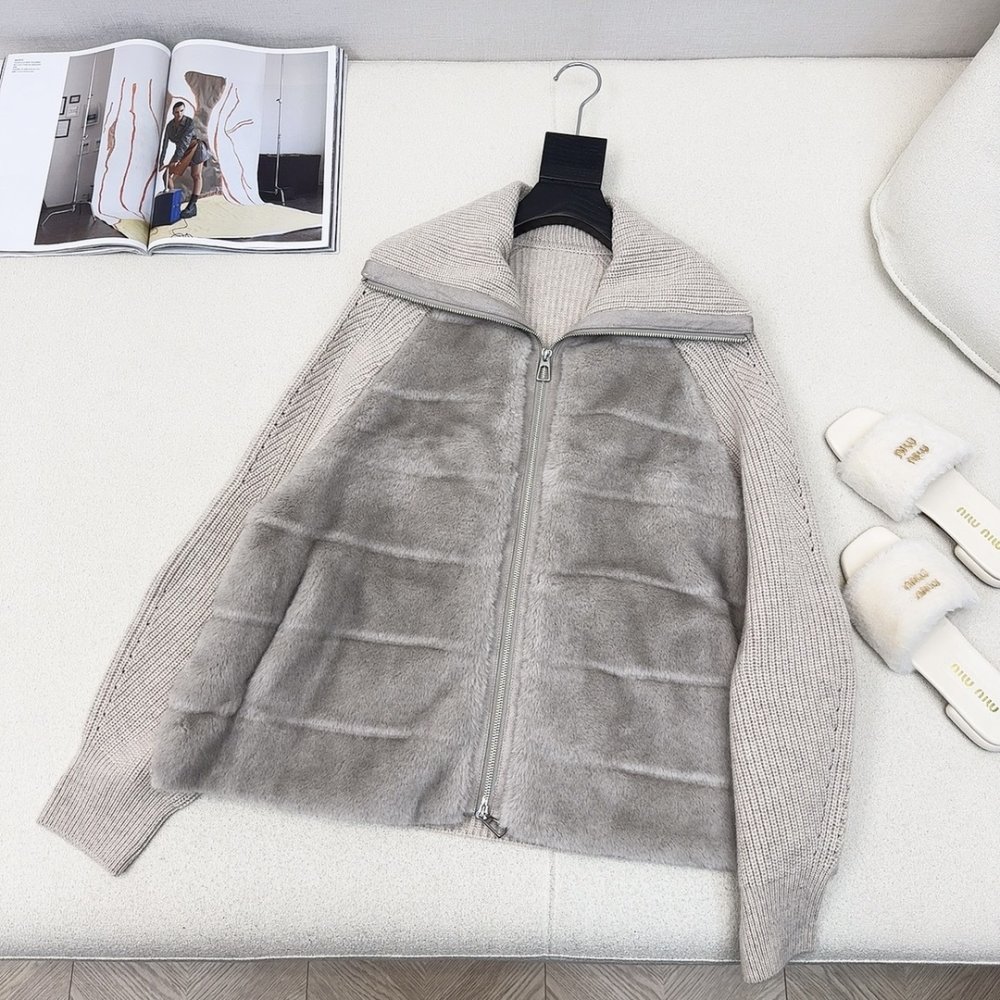 Пуховик меховой женский