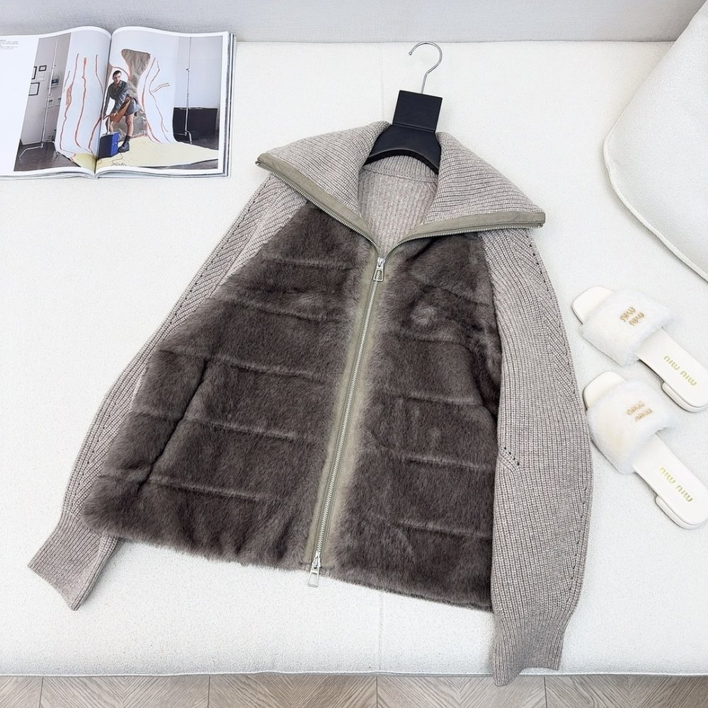 Пуховик меховой женский