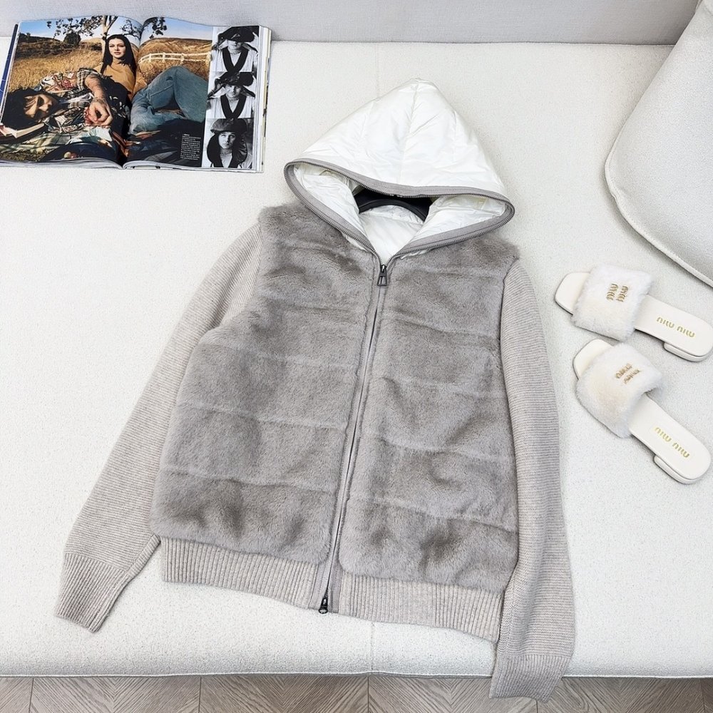 Пуховик меховой женский