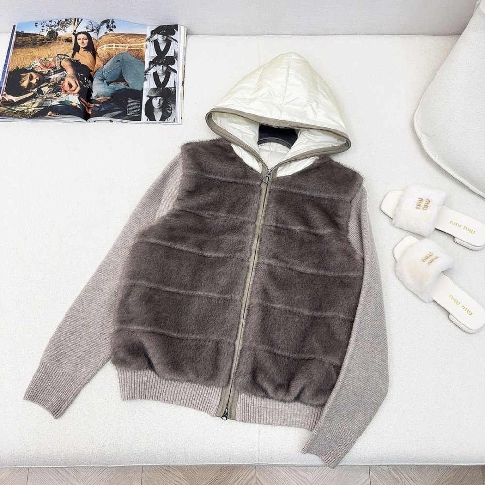 Пуховик меховой женский