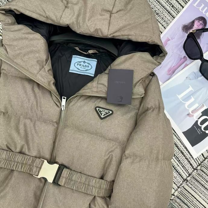 Пуховик з капюшоном жіночий фото 2