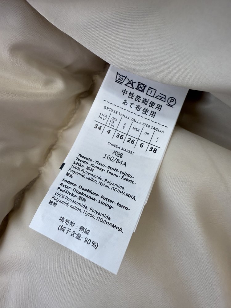 Пуховик з коміром стійкою і довгими рукавами фото 9