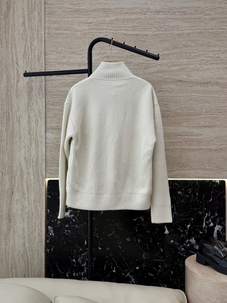 Пуховик женский с кашемировыми рукавами фото 2