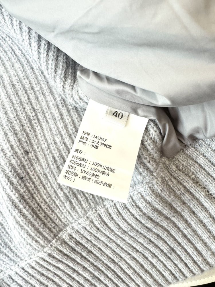 Down jacket female from кашемировыми sleeves фото 9