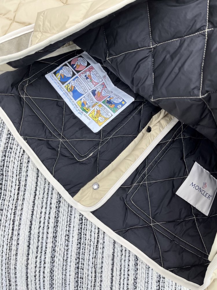 Пуховик жіночий зі съёмным хутряним коміром фото 8