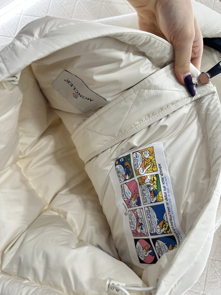 Пуховик жіночий фото 5