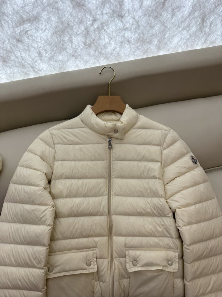 Пуховик жіночий фото 6