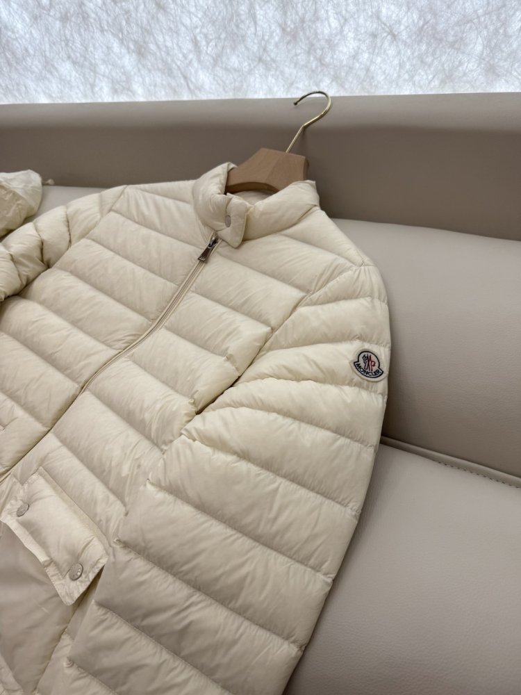 Пуховик жіночий фото 7