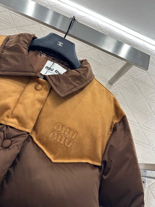 Пуховик жіночий фото 8