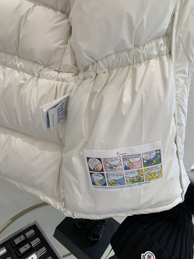 Пуховик женский фото 9