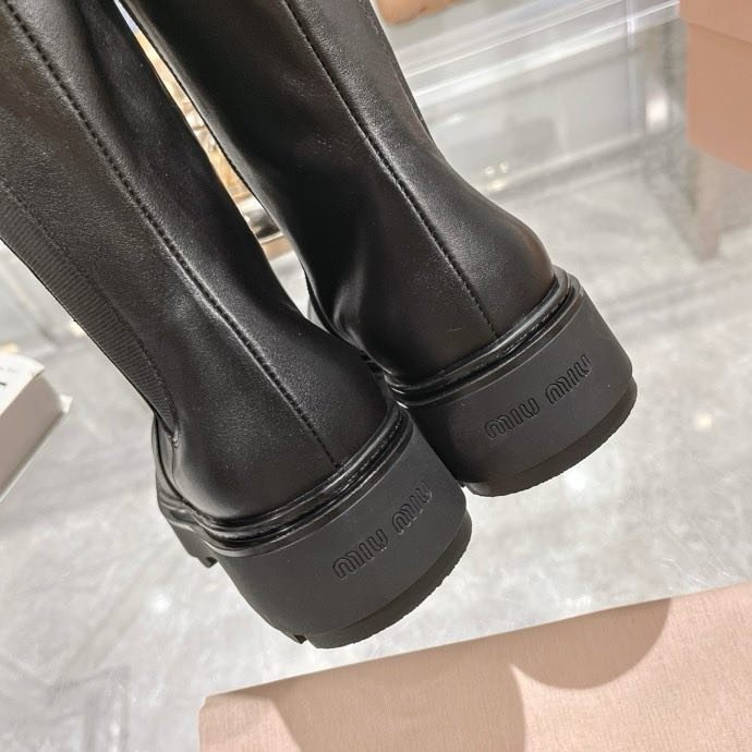 Сапоги женские фото 8