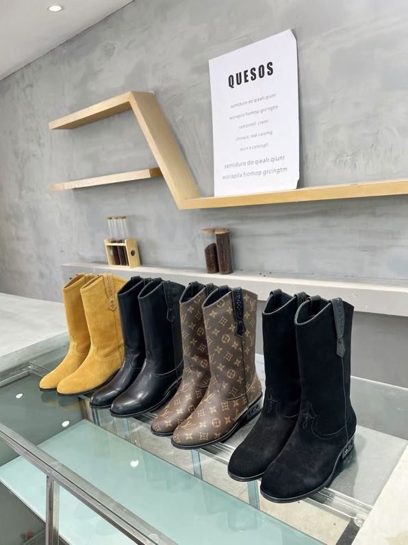 Сапоги женские фото 9