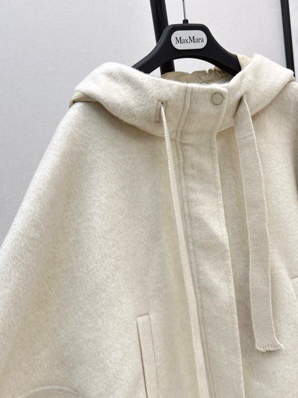 Вовняна коротка куртка з капюшоном фото 8