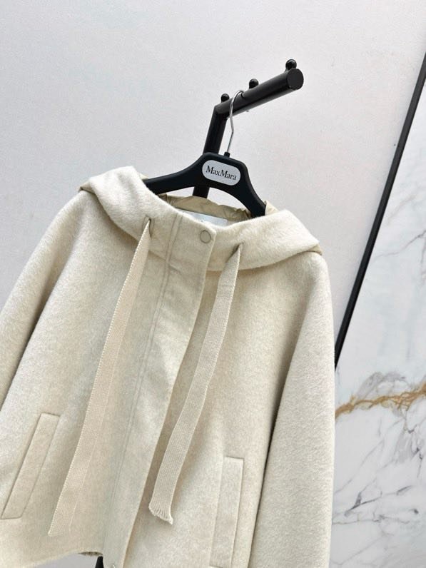 Вовняна коротка куртка з капюшоном фото 9