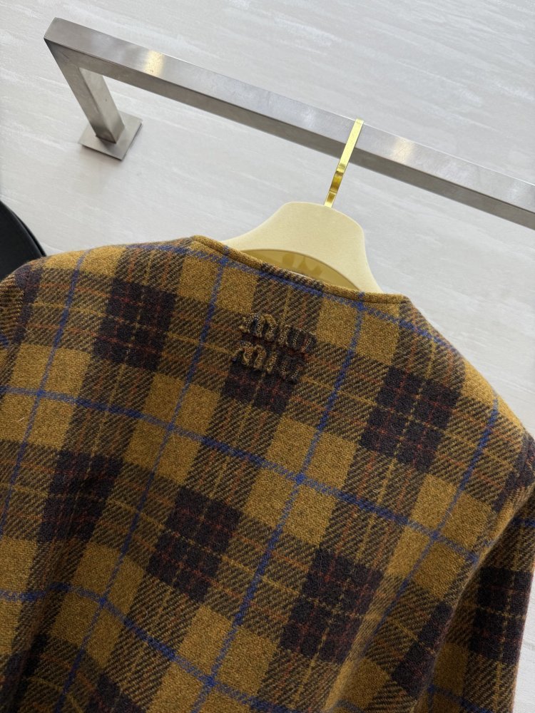 Шерстяное клетчатое пальто фото 9