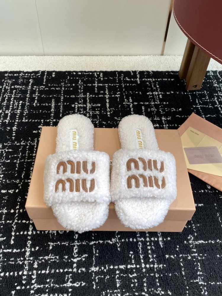 Шльопанці хутряні жіночі