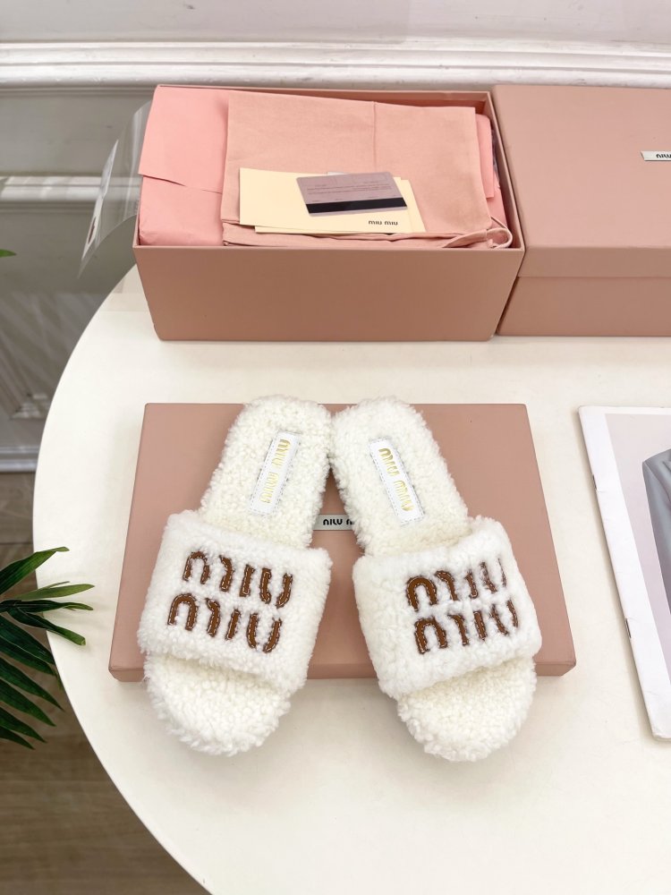 Шлепанцы меховые женские