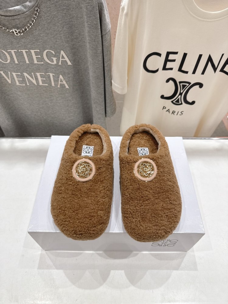 Шльопанці хутряні жіночі