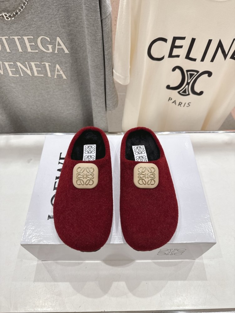 Шльопанці хутряні жіночі