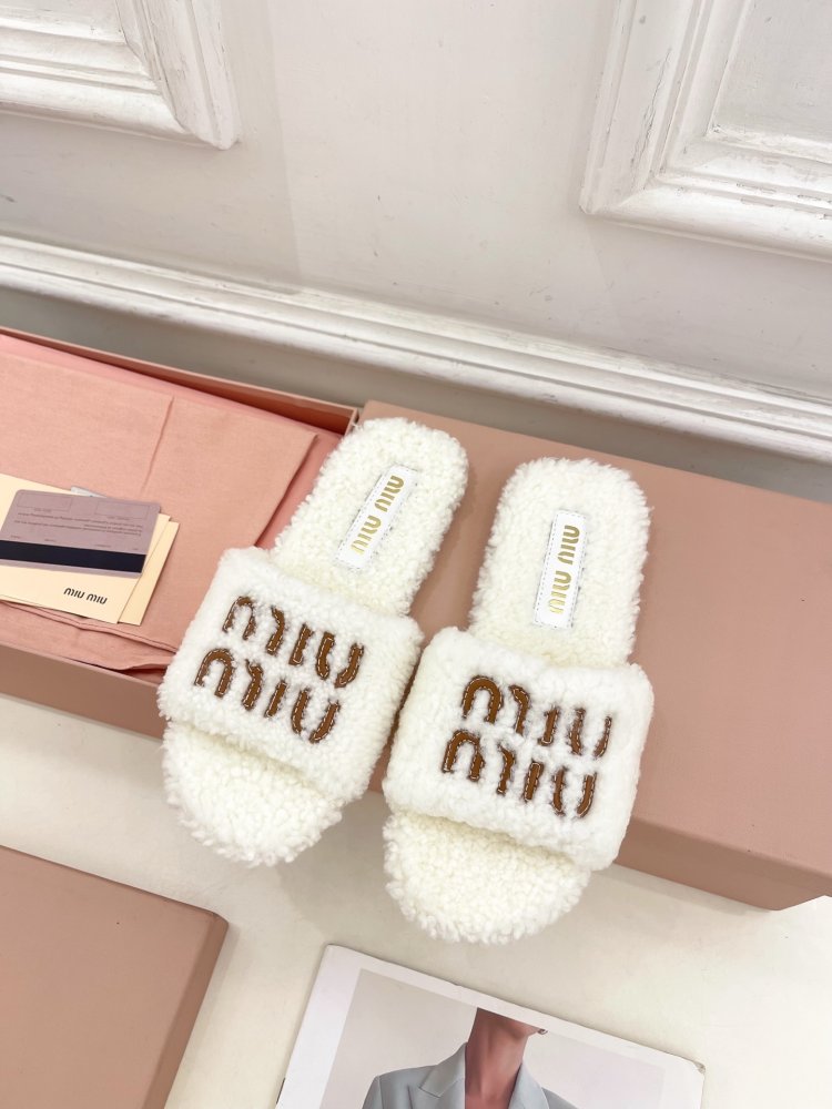 Шлепанцы меховые женские фото 3