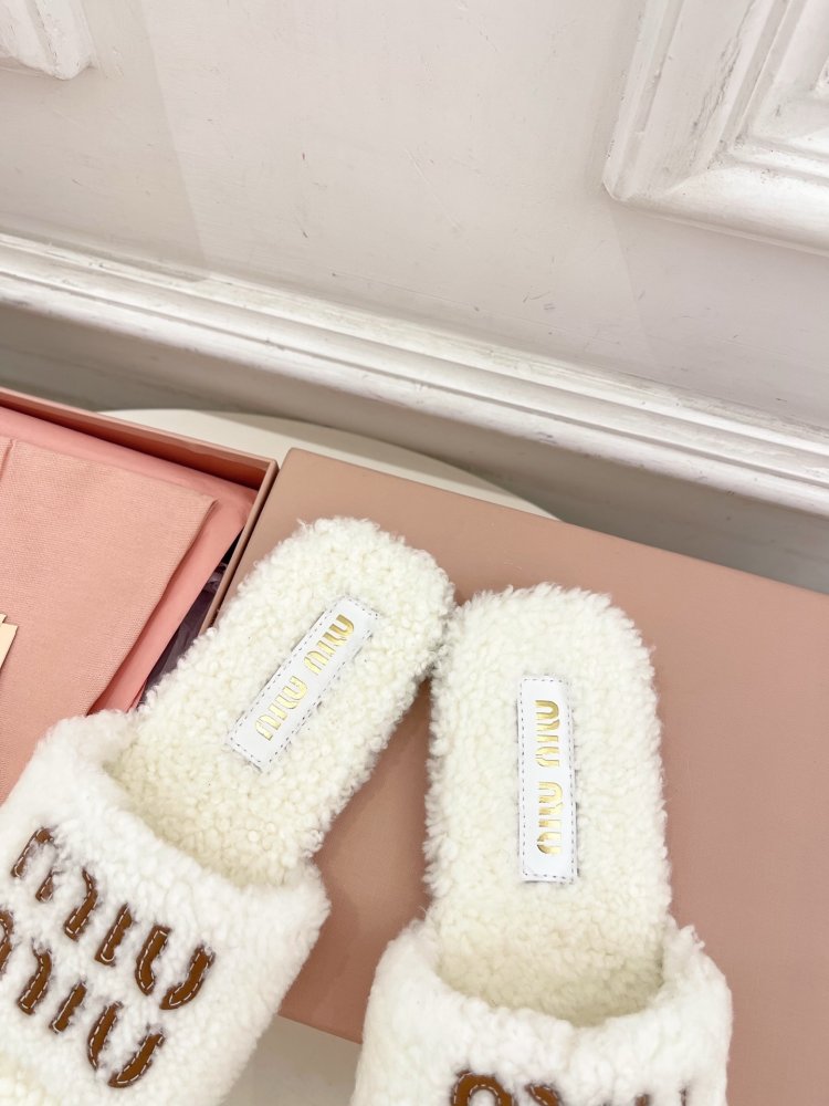 Шлепанцы меховые женские фото 7