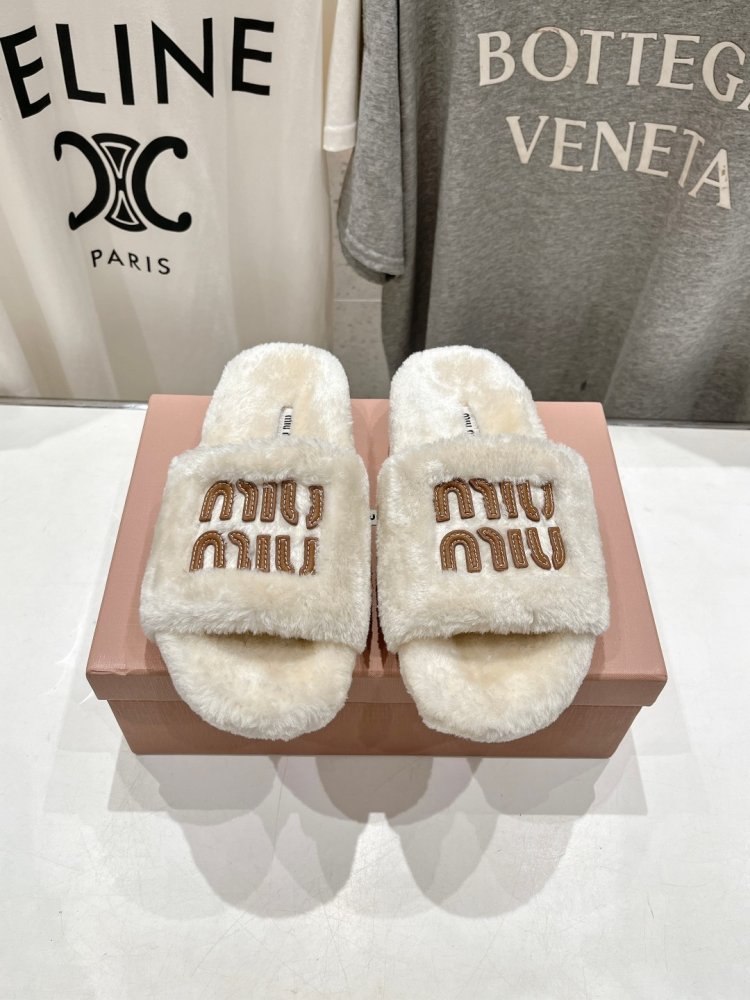 Шльопанці на хутрі жіночі