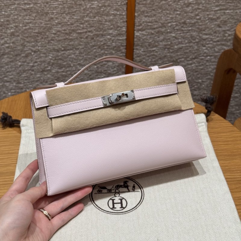Сумка клатч кожаная Kelly Pochette 22 см в коже Swift