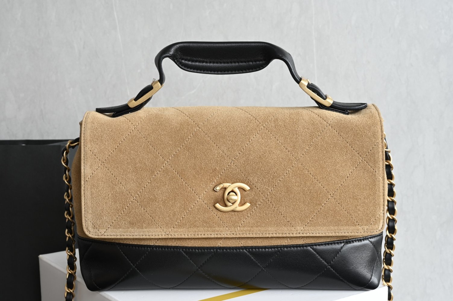 A bag leather Coco Base Suede Handle Flap Bag
