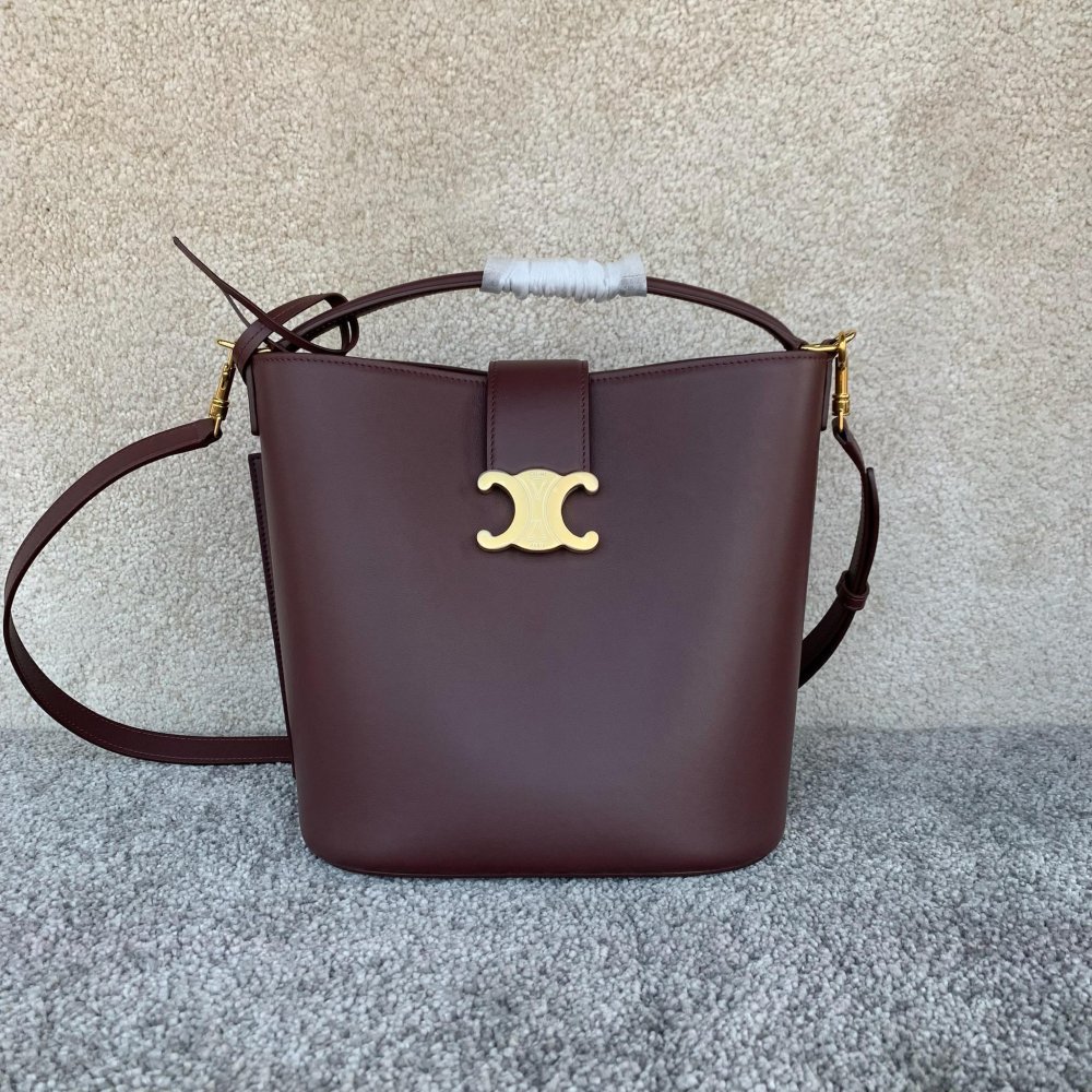 A bag LOUISE 28 cm of smooth veal skin