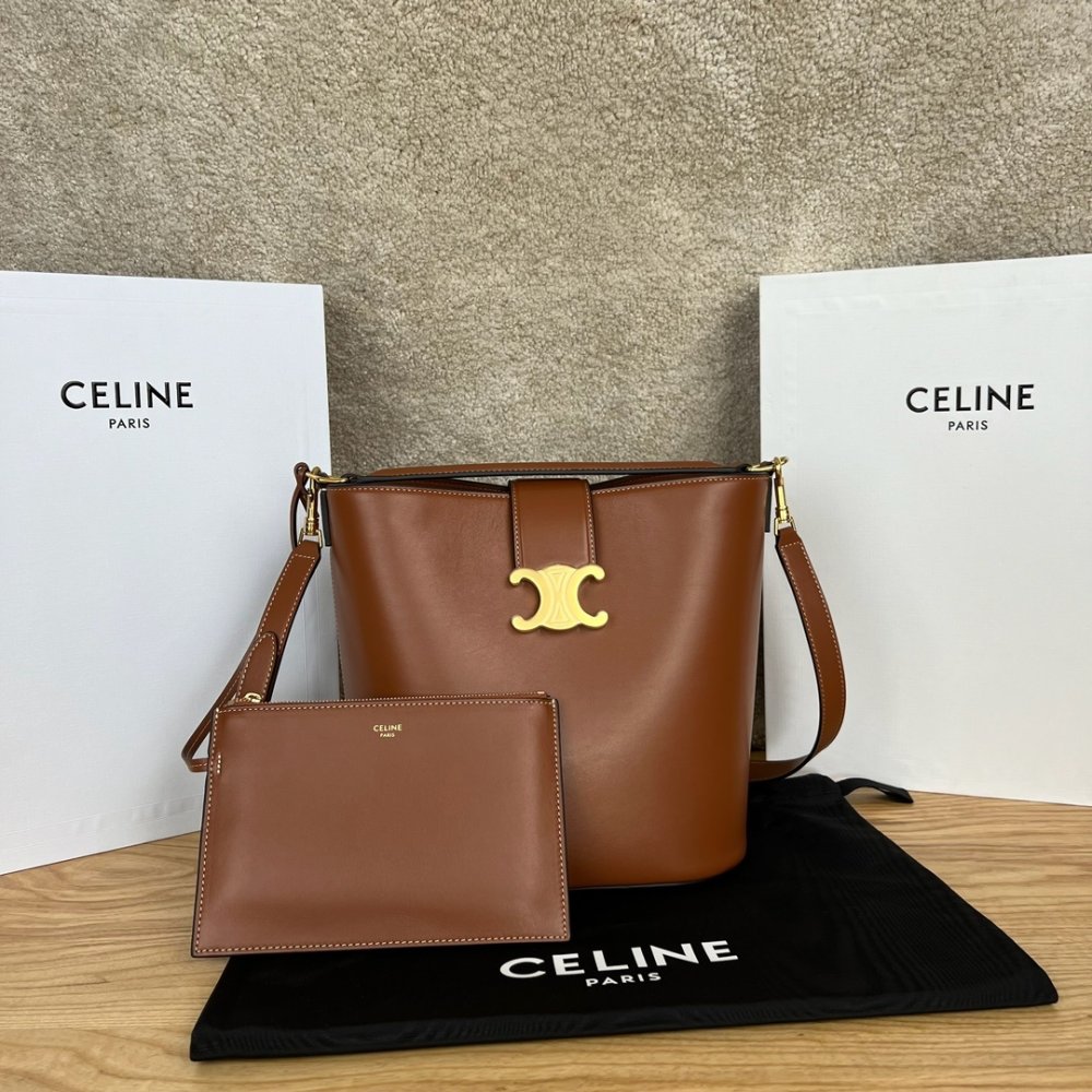 A bag LOUISE 28 cm of smooth veal skin