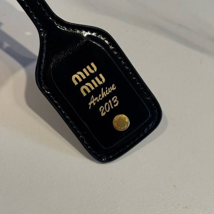 Сумка Miu Miu Solitaire из блестящей кожи фото 7