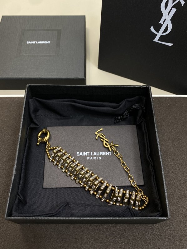 Винтажный золотой браслет YSL с бриллиантами