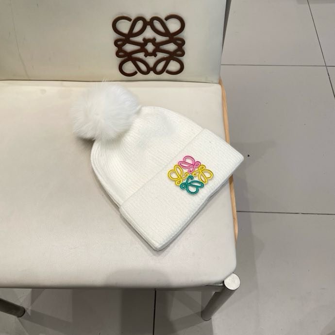 Вязаная шапка с лисьим мехом фото 2