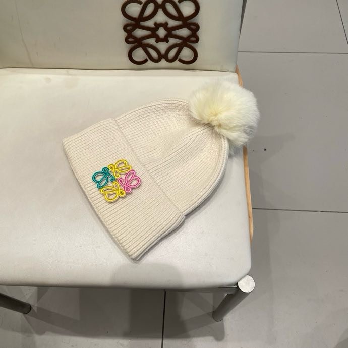 Вязаная шапка с лисьим мехом фото 2