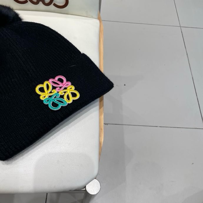 Вязаная шапка с лисьим мехом фото 2