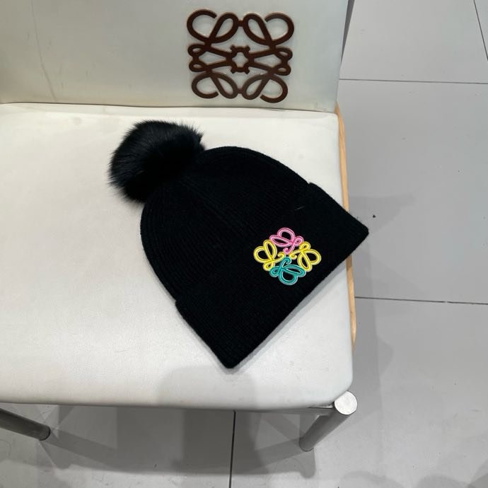 Вязаная шапка с лисьим мехом фото 3