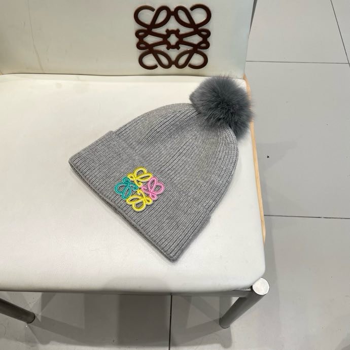 Вязаная шапка с лисьим мехом фото 4