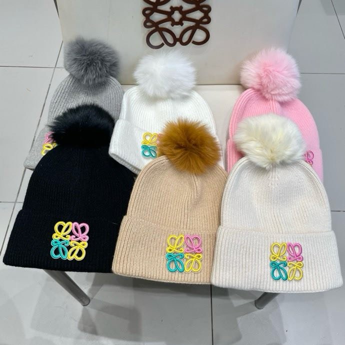 Вязаная шапка с лисьим мехом фото 4